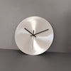 Minutra Wanduhr Aus Edelstahl Mit Präziser Zeitanzeige Und Zeitlosem Design