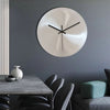 Minutra Wanduhr Aus Edelstahl Mit Präziser Zeitanzeige Und Zeitlosem Design