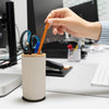 Magnetic soap dispenser and magnetic toothbrush cup including pads