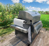 Magnetic kitchen roll holder including metal bar