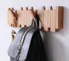 PIANOHANG – Klavier-Inspirierte Wandgarderobe aus Massivholz mit Klappbaren Haken