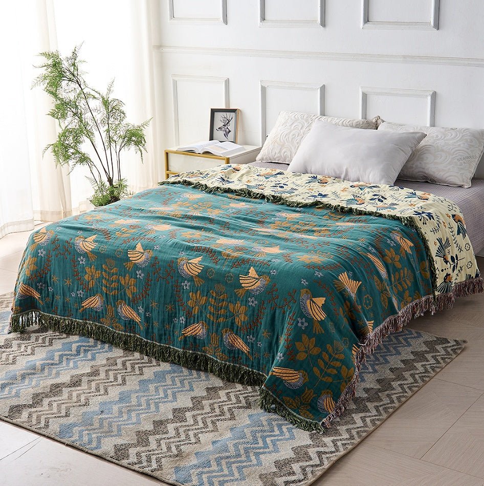 REVERSIBIRD – Wendbare skandinavische Vogel-Überwurfdecke aus 100 % Baumwolle 1